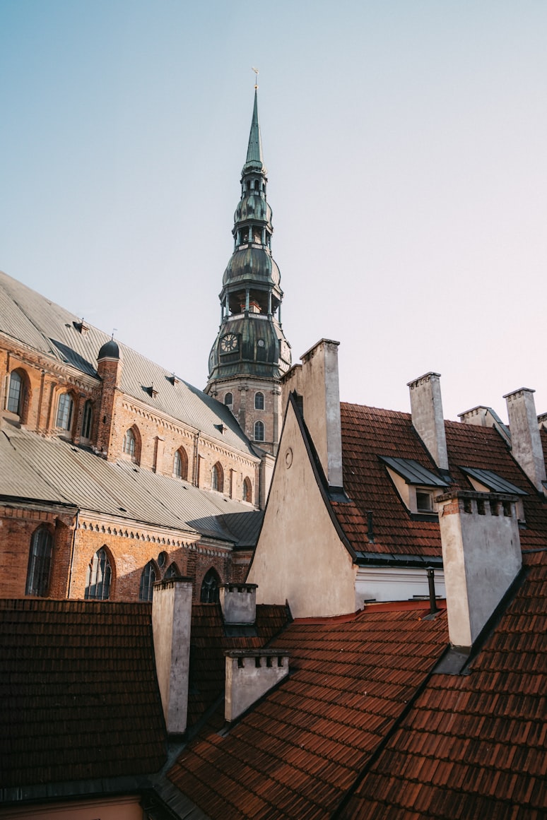 St. Peter's Church tower rising above Riga's Old Town rooftops